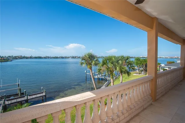 a view of a lake from a balcony