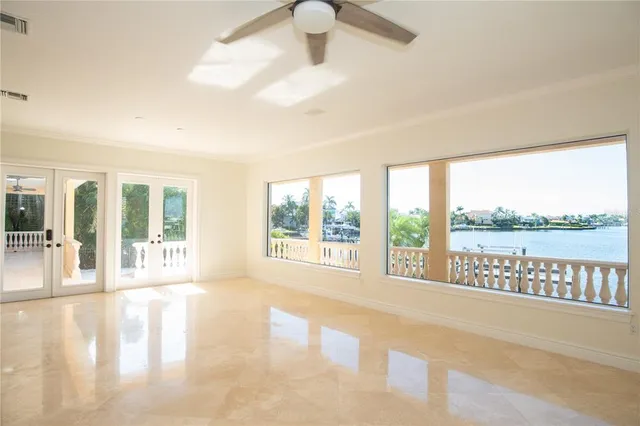 a view of an entryway with a floor to ceiling window