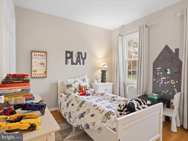 a bed room with bed and a couch