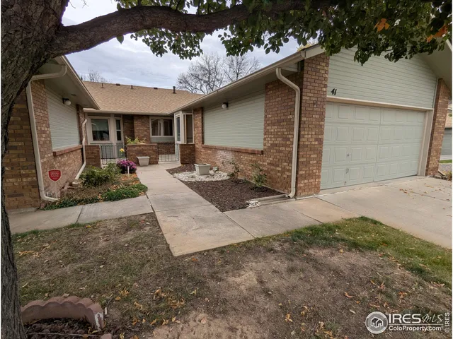 a front view of house with yard