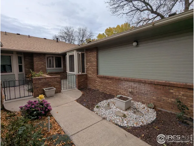 a view of livingroom with furniture and a fireplace
