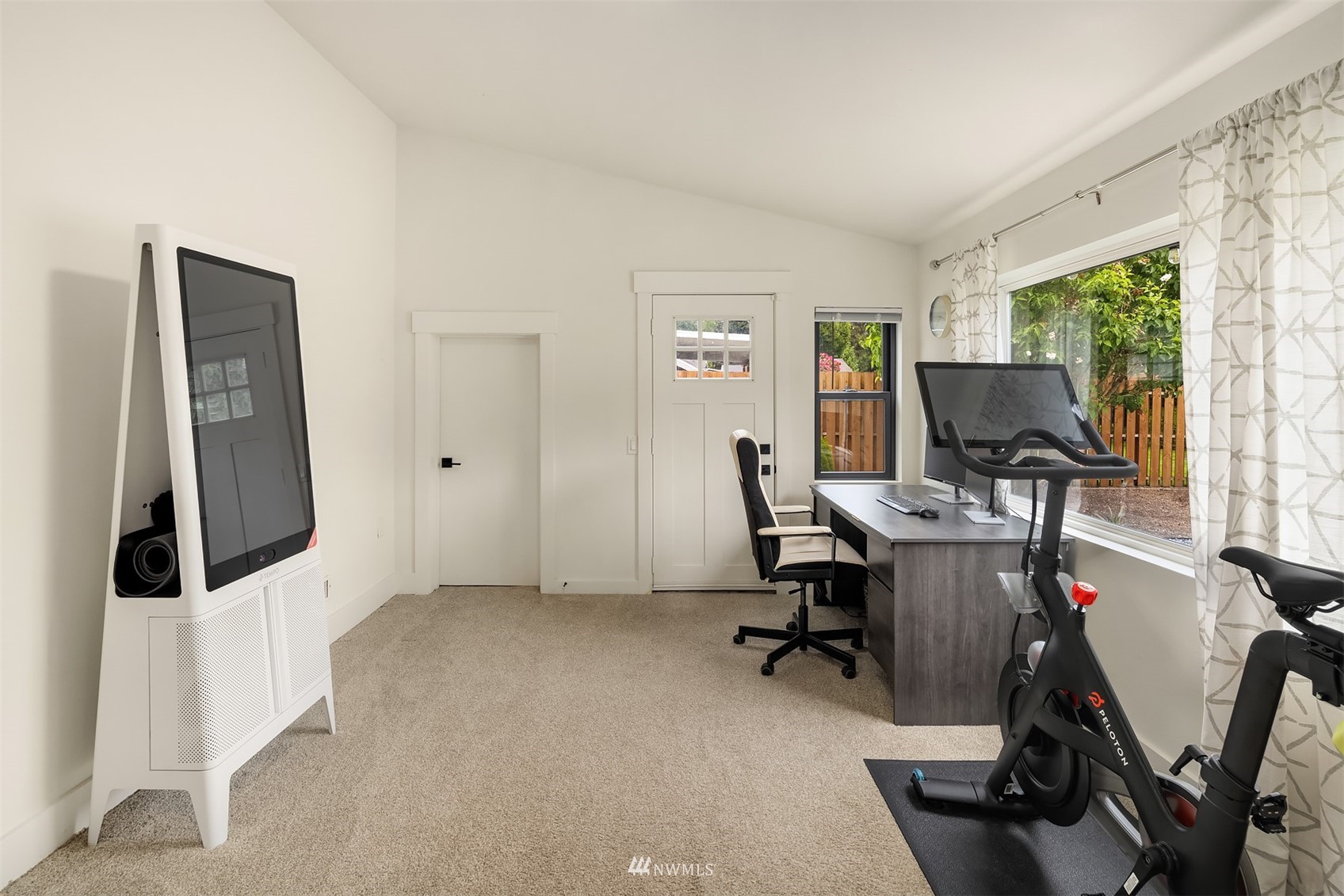 3115 Southeast 5th Street Renton, WA 98058 - Photo 14 of 25 a view of a workspace with furniture and a window
