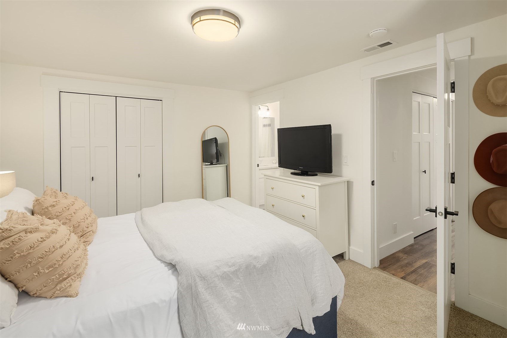 3115 Southeast 5th Street Renton, WA 98058 - Photo 18 of 25 a bedroom with a bed window and a flat screen tv