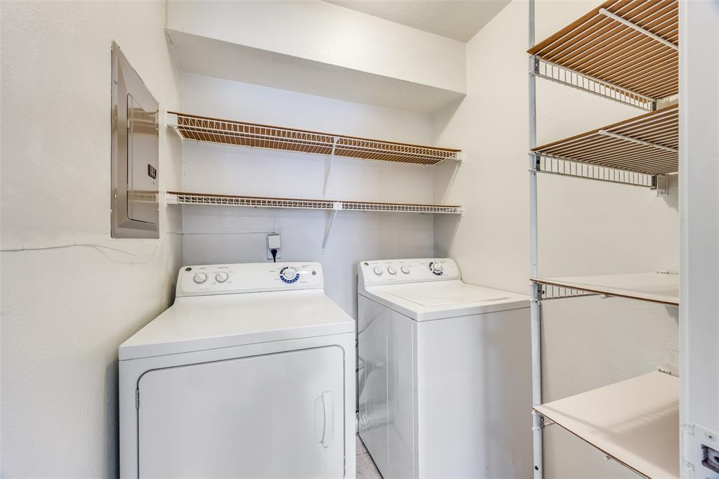 13220 Woodbend Lane Dallas, TX 75243 - Photo 13 of 26 a utility room with dryer and washer