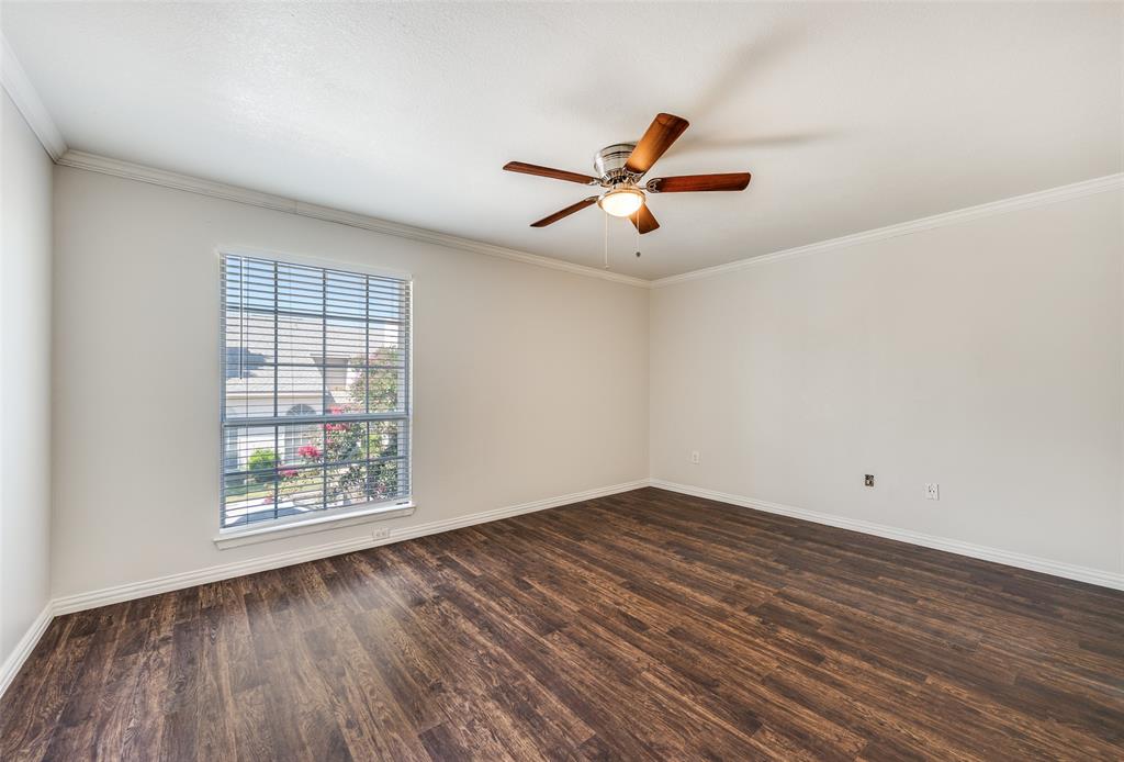 13220 Woodbend Lane Dallas, TX 75243 - Photo 19 of 26 wooden floor in an empty room with a window