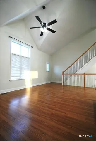 a bathroom with a toilet a sink and a mirror