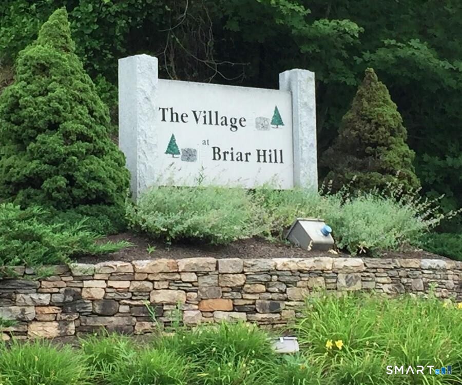 152 Briar Lane, Unit 152 Norwich, CT 06360 - Photo 2 of 33 a sign on the side of a building