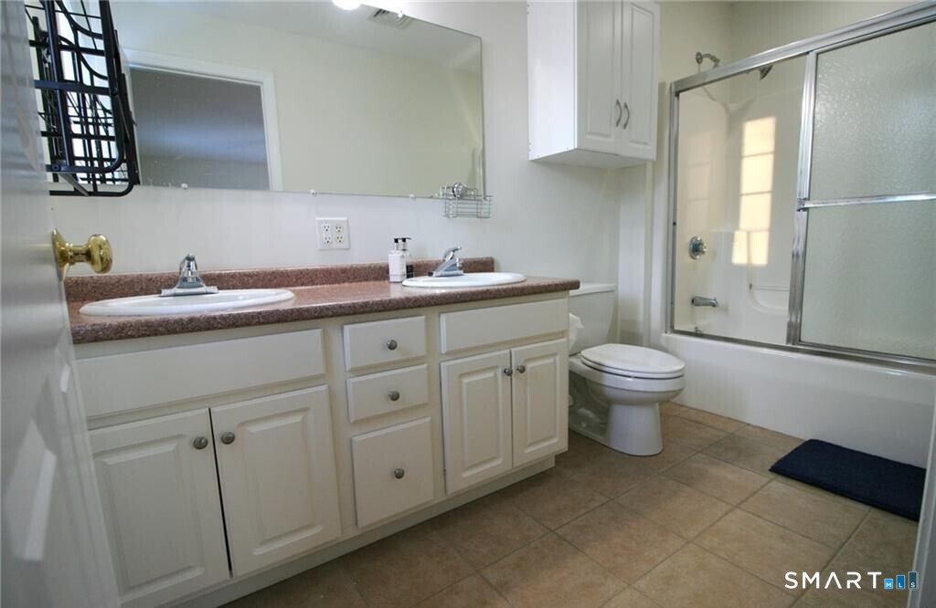 152 Briar Lane, Unit 152 Norwich, CT 06360 - Photo 22 of 33 a bathroom with a sink toilet and shower