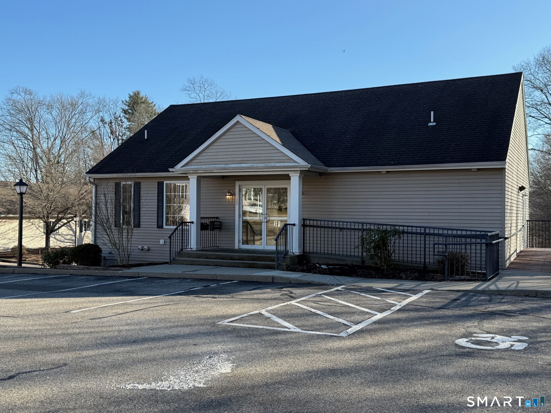152 Briar Lane, Unit 152 Norwich, CT 06360 - Photo 31 of 33 a front view of a house with a garden