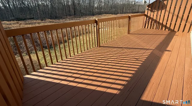 an empty room with a empty space and a ceiling fan