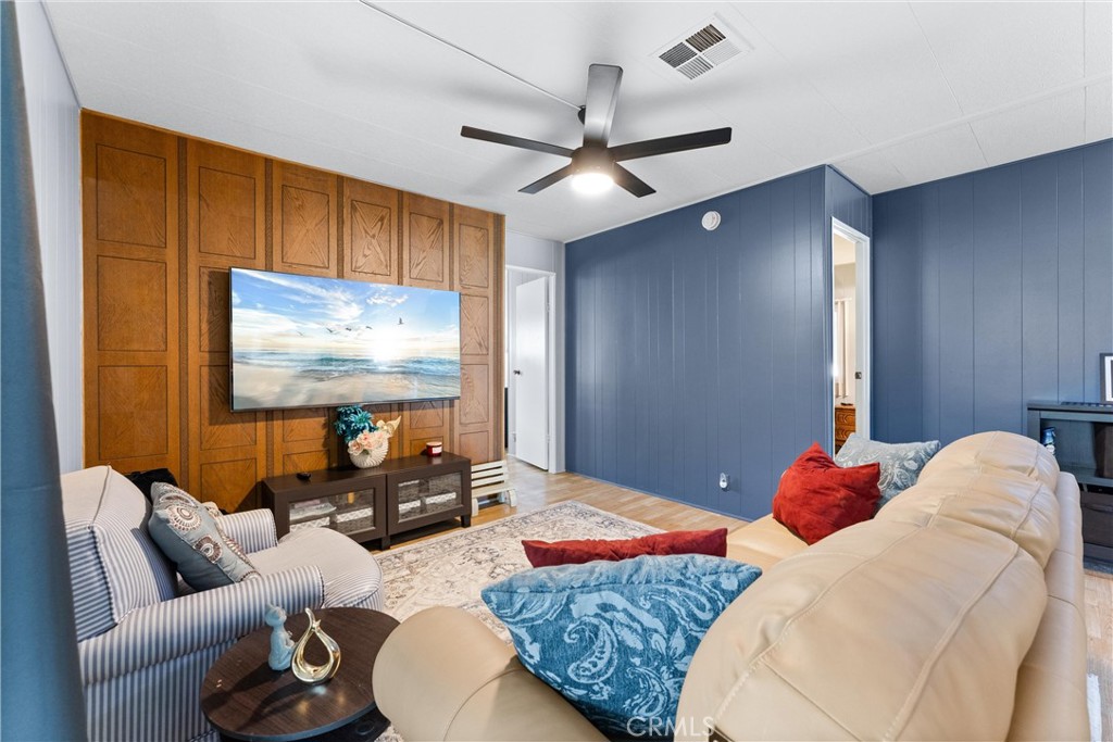 1400 Sunkist, Unit 173 Anaheim, CA 92806 - Photo 11 of 42 a bedroom with a bed couch and dresser