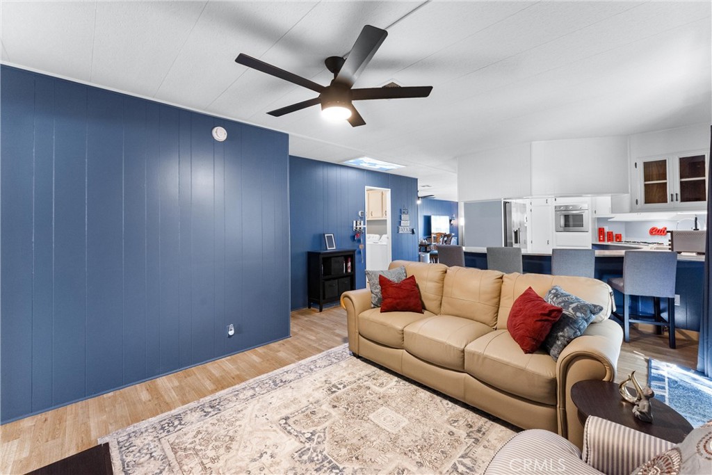 1400 Sunkist, Unit 173 Anaheim, CA 92806 - Photo 12 of 42 a living room with furniture and a ceiling fan