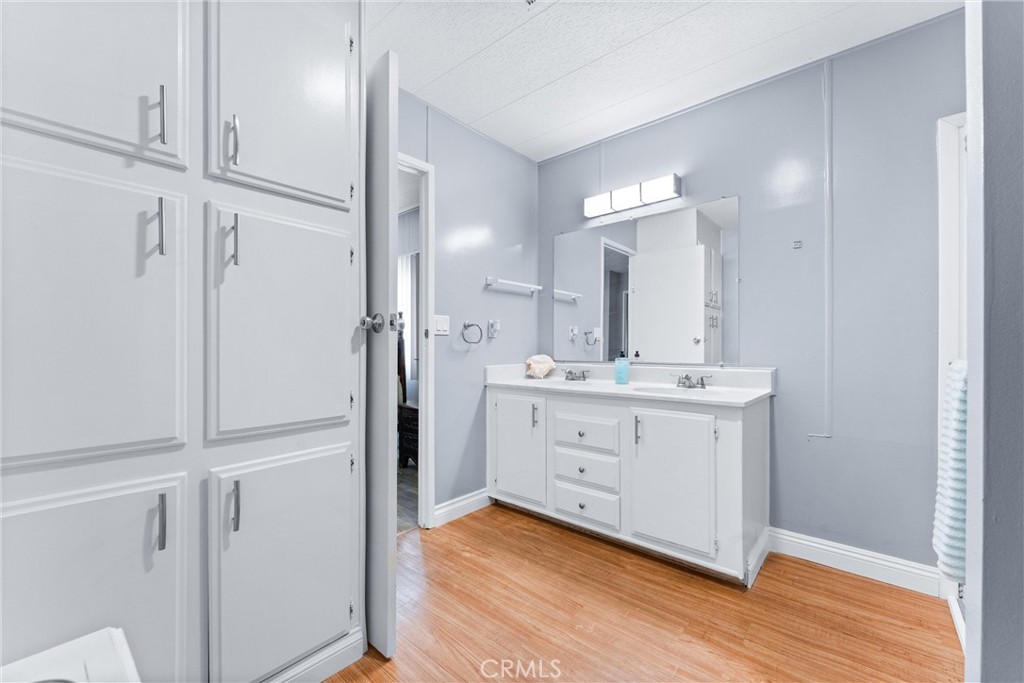 1400 Sunkist, Unit 173 Anaheim, CA 92806 - Photo 22 of 42 Primary bathroom. Look at all this storage and you still have lots of space too.