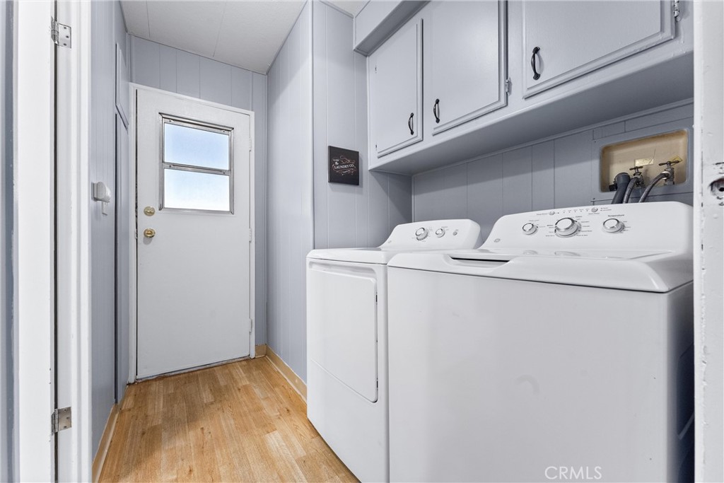 1400 Sunkist, Unit 173 Anaheim, CA 92806 - Photo 27 of 42 Nice size inside laundry room with storage. Side entrance from your covered driveway.
