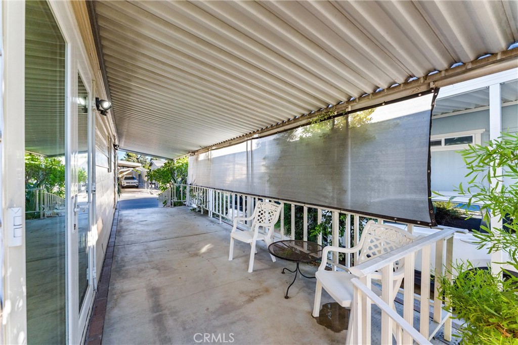 1400 Sunkist, Unit 173 Anaheim, CA 92806 - Photo 7 of 42 Lovely large covered patio with shades
