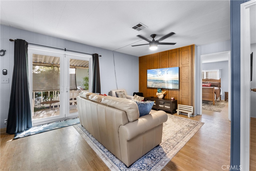 1400 Sunkist, Unit 173 Anaheim, CA 92806 - Photo 10 of 42 a living room with furniture and a flat screen tv