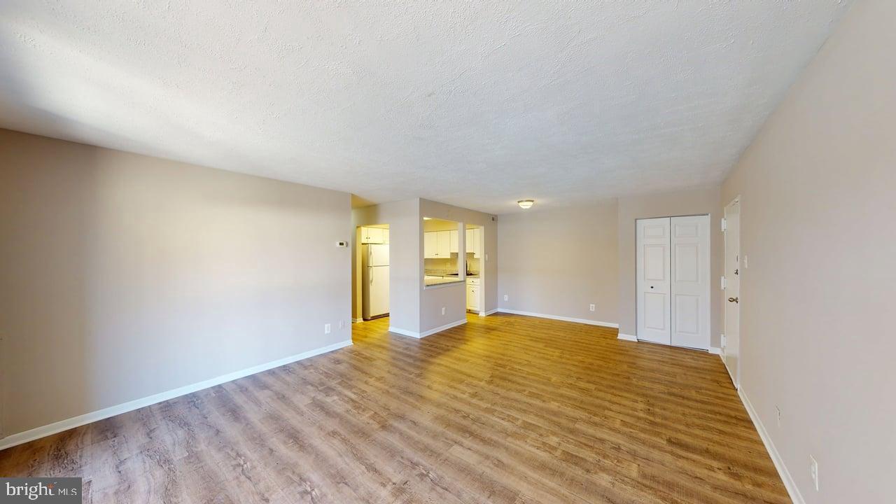10114 Campus Way South, Unit 201 8C Upper Marlboro, MD 20774 - Photo 3 of 17 a view of an empty room and window