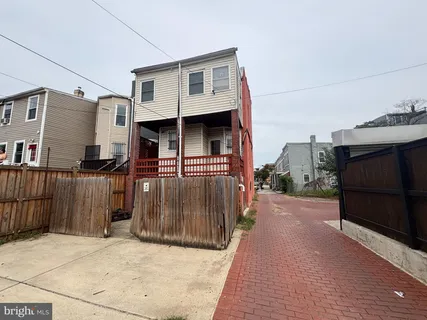 a front view of a house with parking