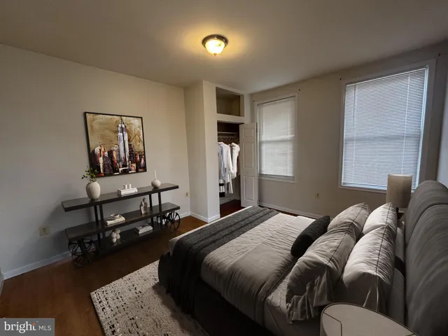 a view of a balcony with wooden floor