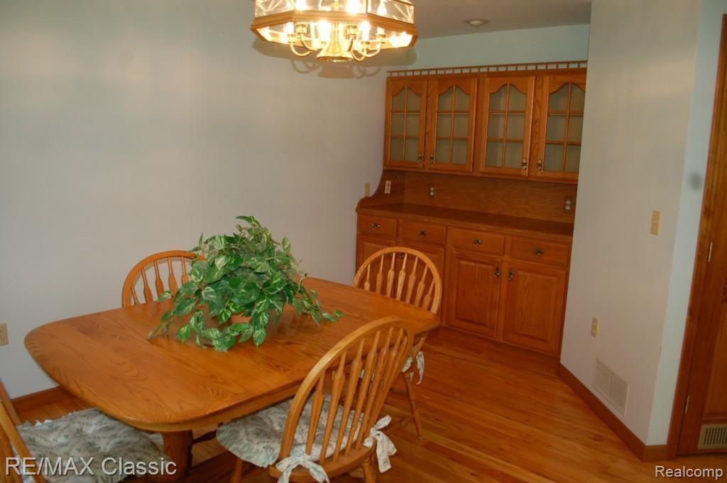 9745 North Eston Road Clarkston, MI 48348 - Photo 12 of 53 DINING ROOM WITH HUTCH