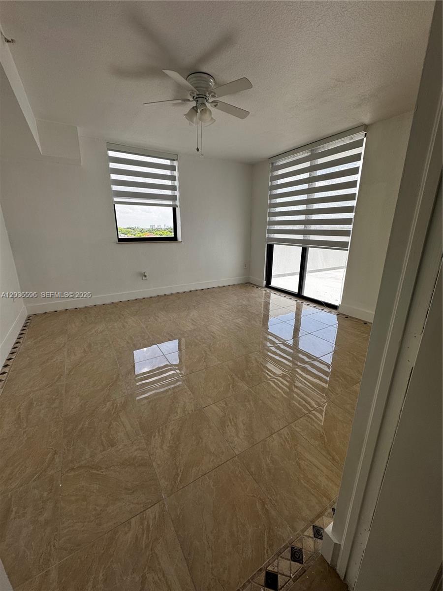 2301 Southwest 27th Avenue, Unit 503 Miami, FL 33145 - Photo 9 of 24 a view of a livingroom with a window