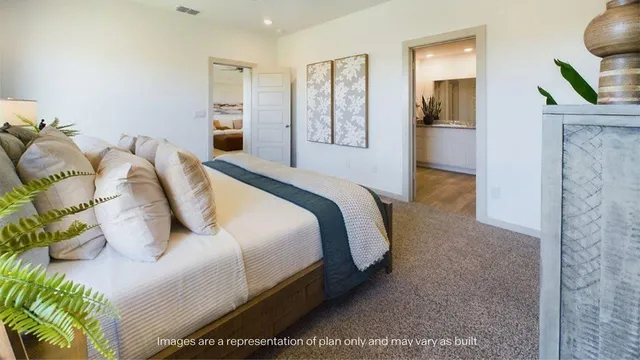 a bathroom with a granite countertop sink a mirror and shower