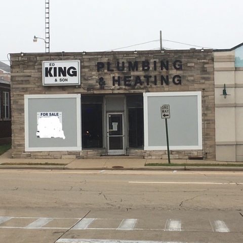 a view of a building and a street