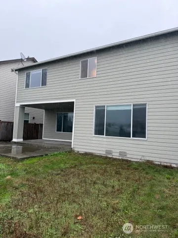 a front view of house with yard