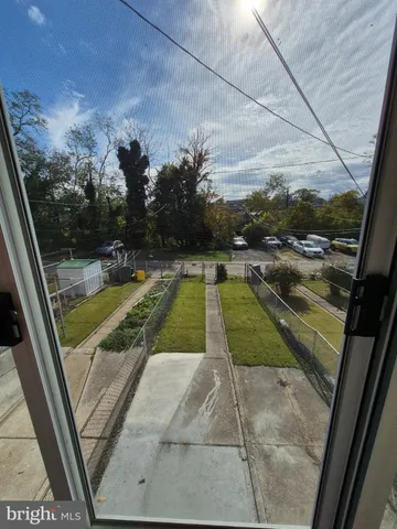 a view of swimming pool from a balcony