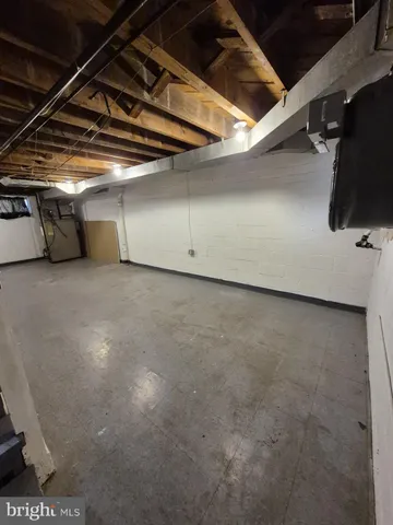 a view of parking and utility room