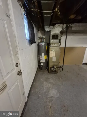 a utility room with a sink a washer and dryer