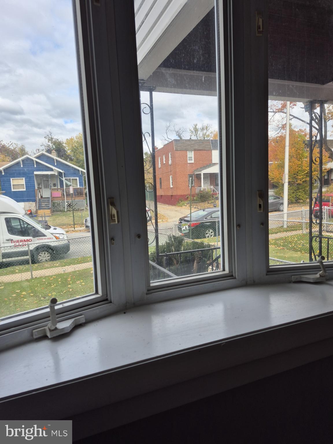 2863 Edgecombe Circle South Baltimore, MD 21215 - Photo 5 of 31 a view of a window with an outdoor space