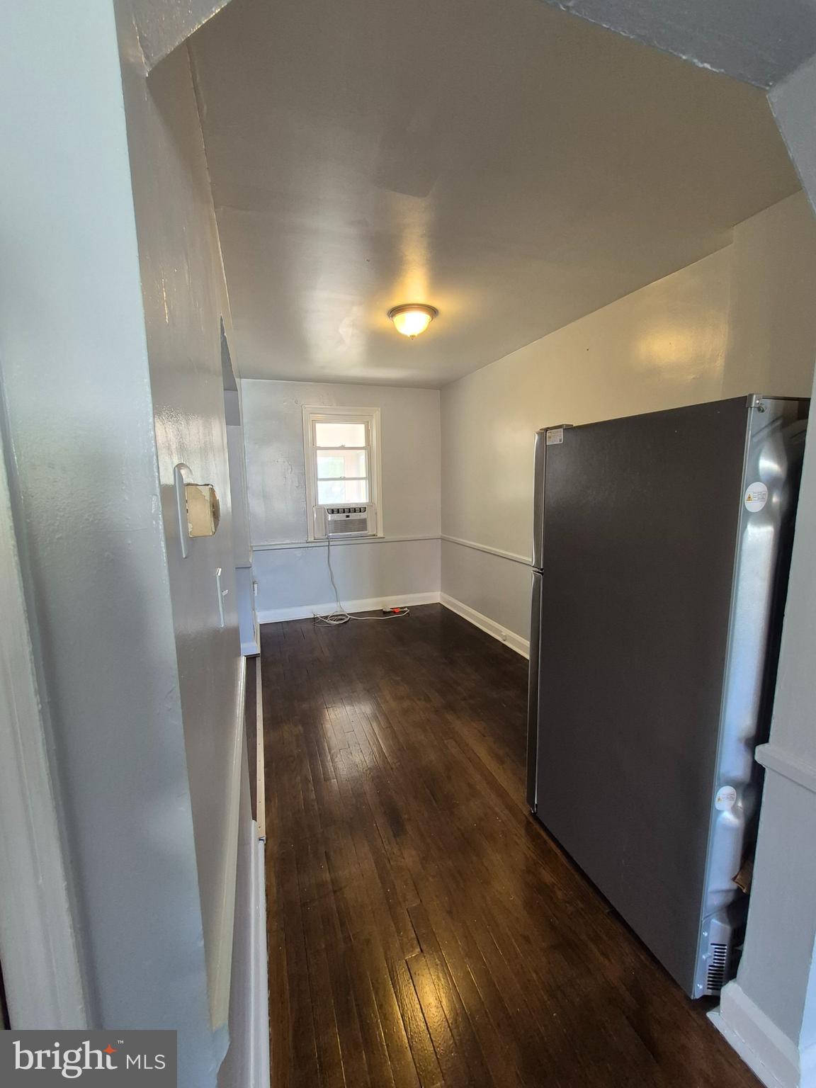 2863 Edgecombe Circle South Baltimore, MD 21215 - Photo 7 of 31 a view of empty room with wooden floor