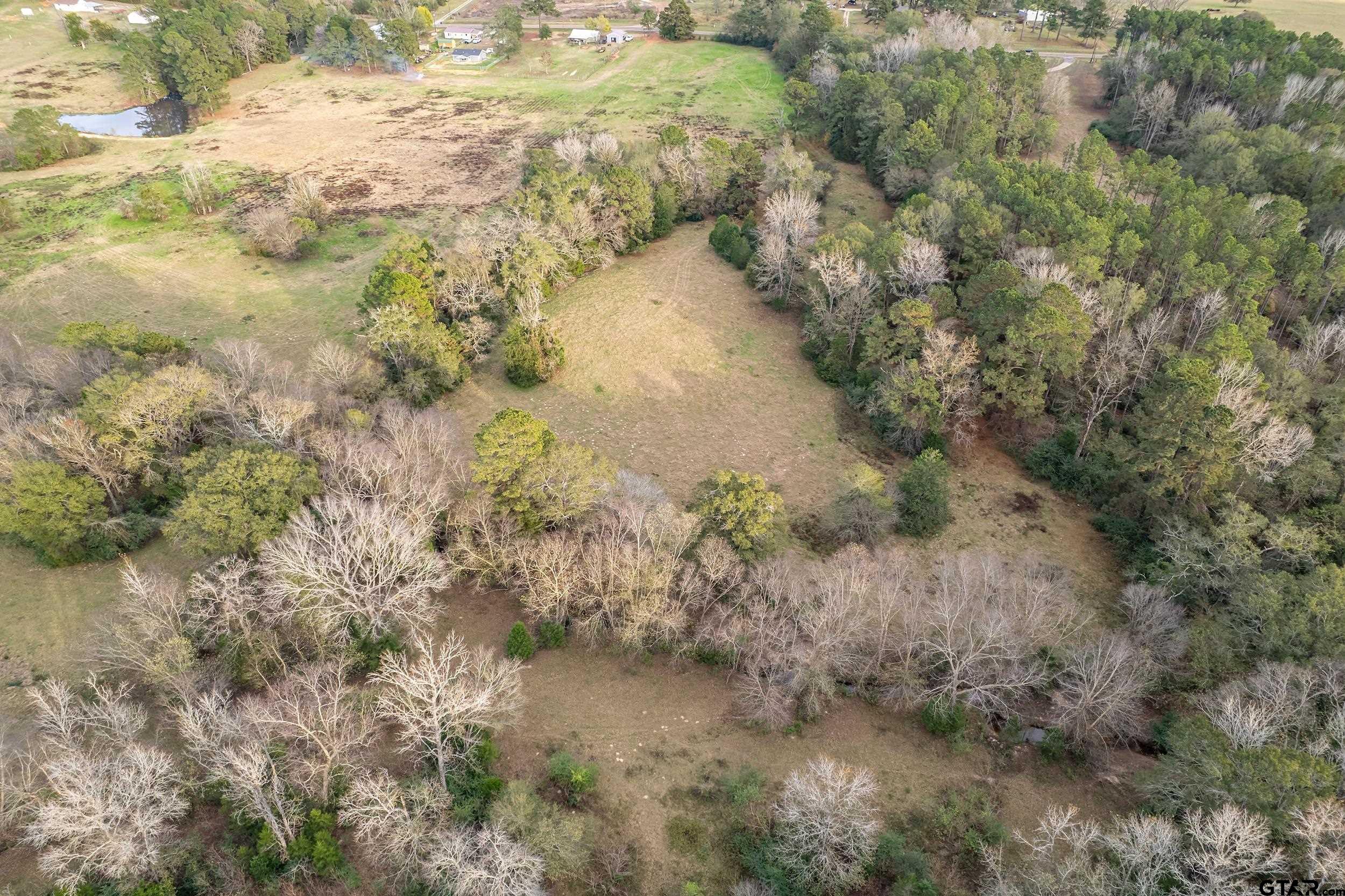 23 St Rusk Tx 75785 Rusk, TX 75785 - Photo 22 of 33 a view of a dry yard with a lake view