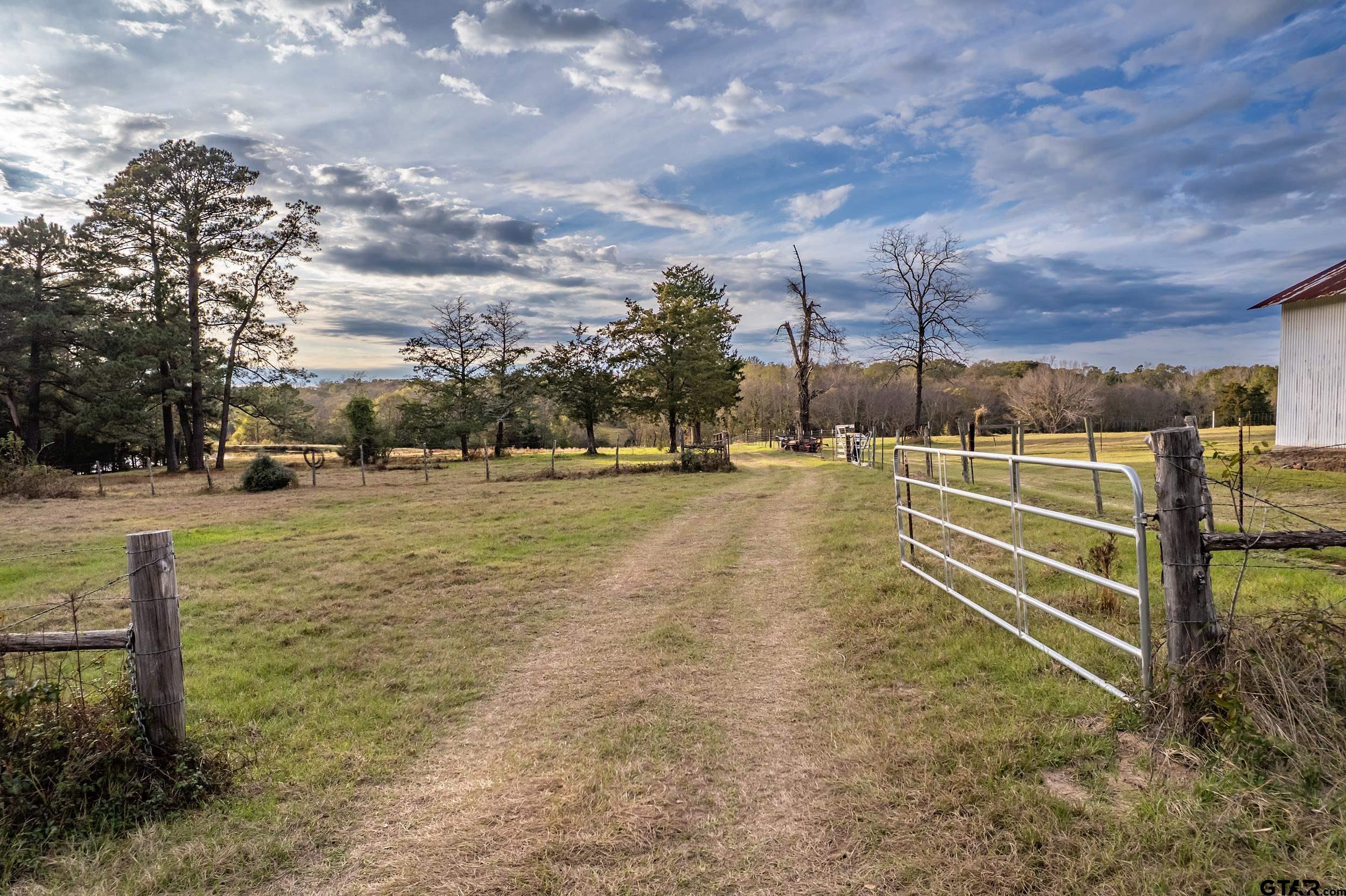 23 St Rusk Tx 75785 Rusk, TX 75785 - Photo 33 of 33 a view of outdoor space with deck and yard
