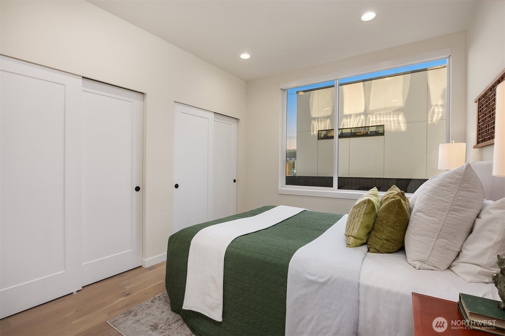 2314 B Fairview Avenue East Seattle, WA 98102 - Photo 20 of 32 a bedroom with a bed and a window