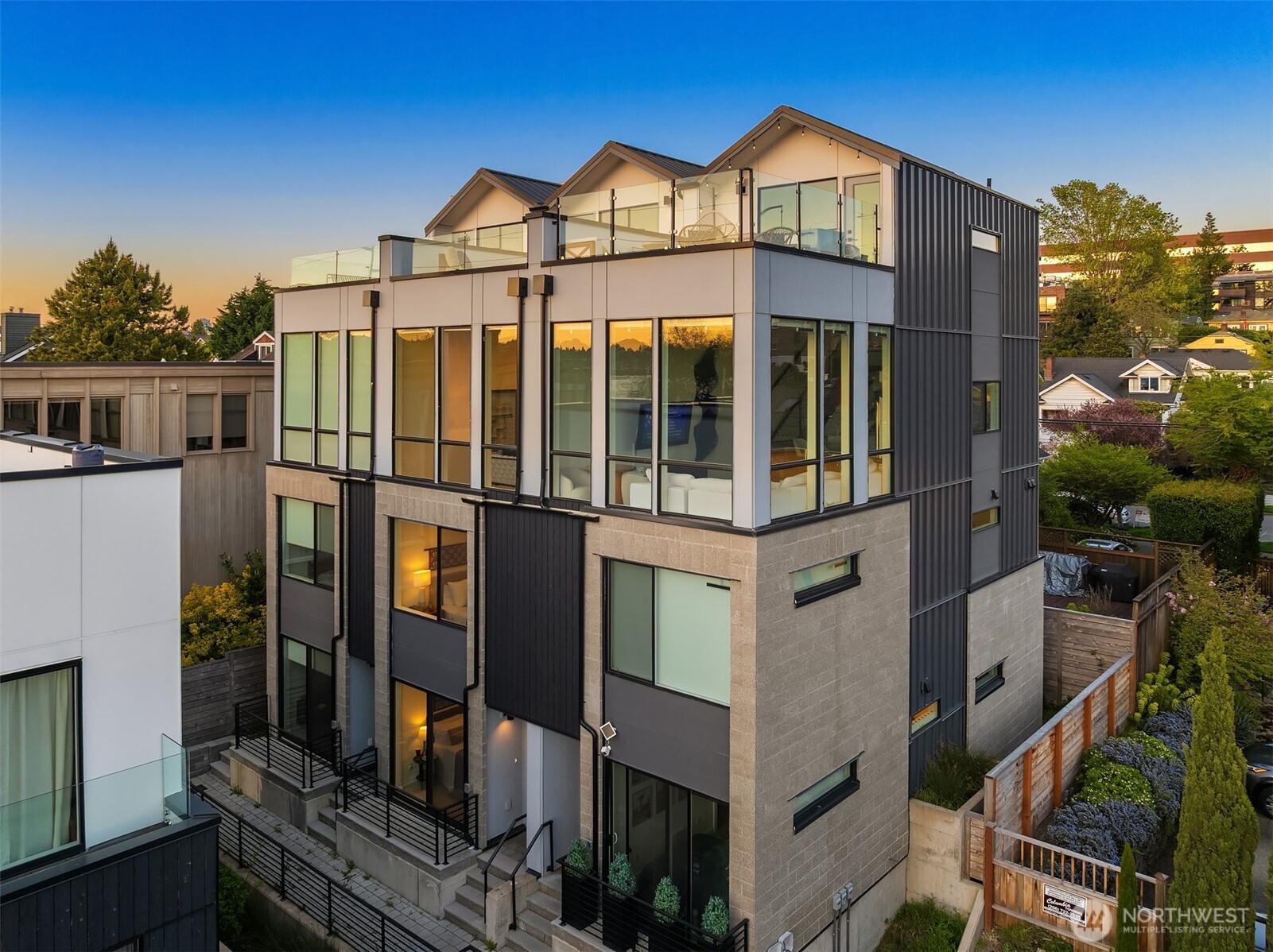 2314 B Fairview Avenue East Seattle, WA 98102 - Photo 2 of 32 a view of a large building with many windows