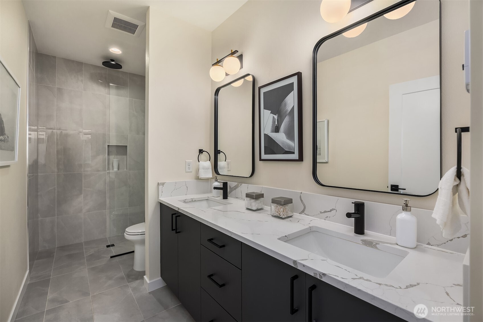 2314 B Fairview Avenue East Seattle, WA 98102 - Photo 21 of 32 a bathroom with a double vanity sink mirror double and shower