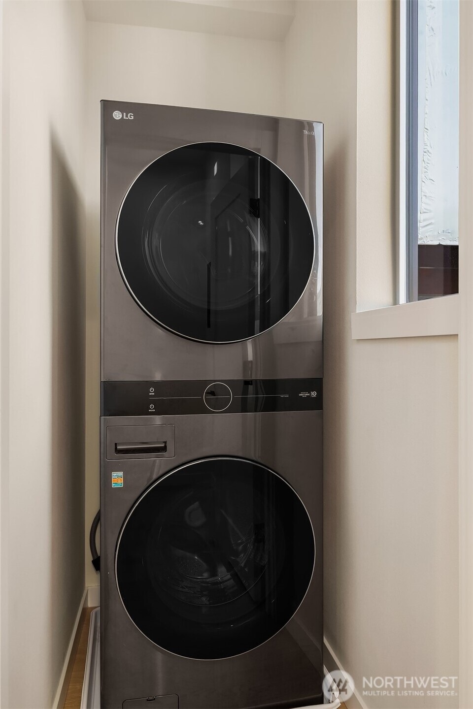 2314 B Fairview Avenue East Seattle, WA 98102 - Photo 23 of 32 a close up view of a washer and dryer