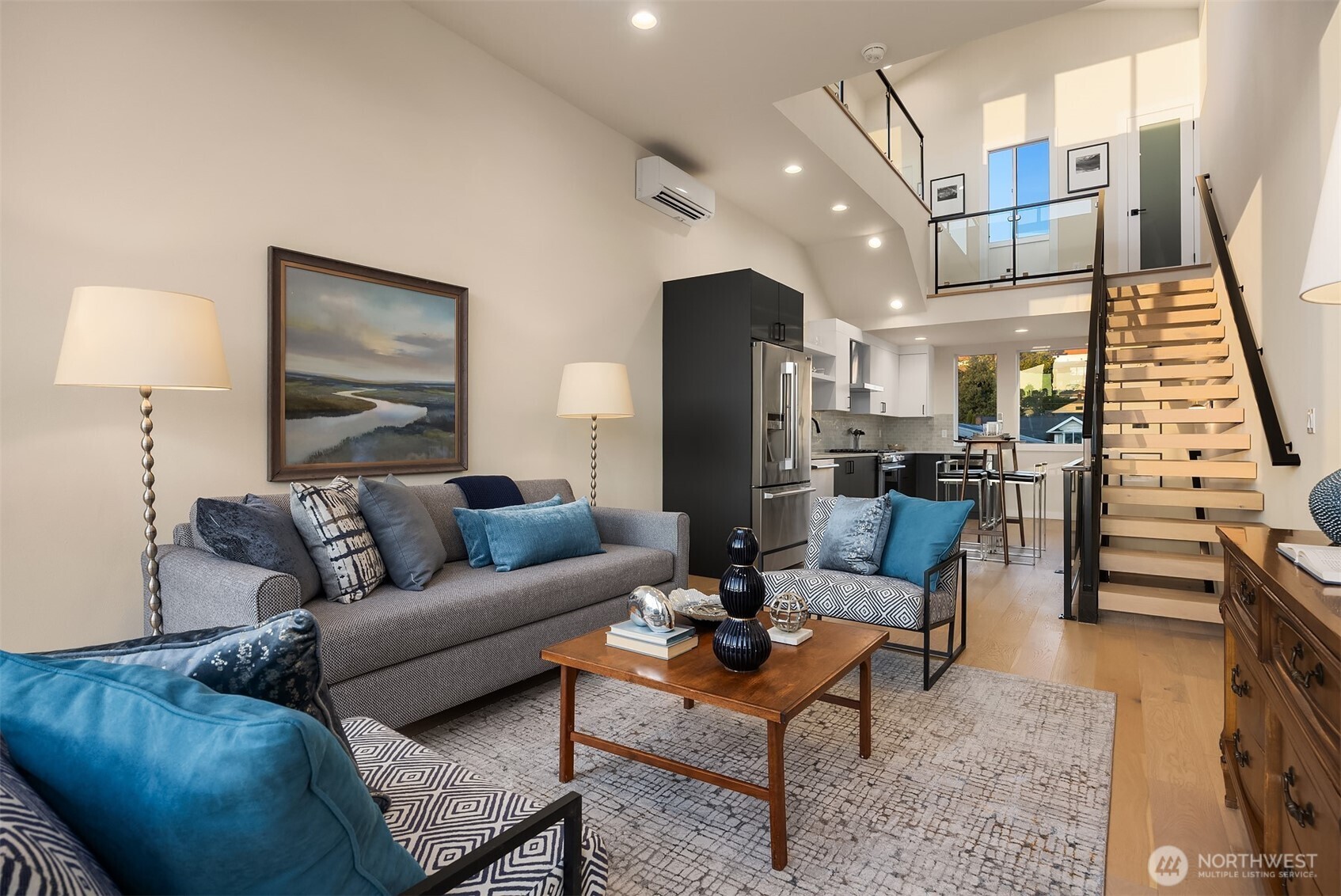 2314 B Fairview Avenue East Seattle, WA 98102 - Photo 7 of 32 a living room with furniture and a wooden floor