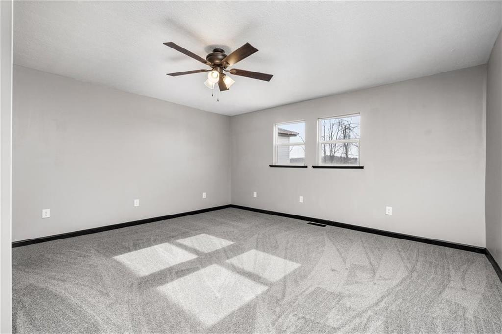 300 3rd Street Langeloth, PA 15054 - Photo 20 of 38 a view of a big room with windows and chandelier fan