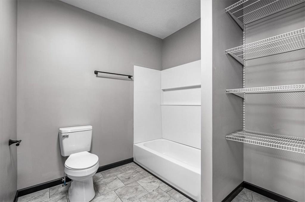 300 3rd Street Langeloth, PA 15054 - Photo 26 of 38 a bathroom with a toilet sink and shower