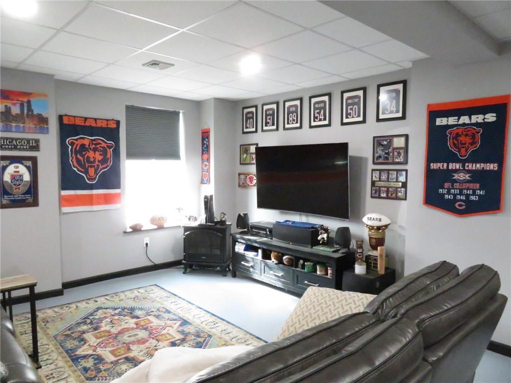 300 3rd Street Langeloth, PA 15054 - Photo 28 of 38 a living room with furniture and a flat screen tv