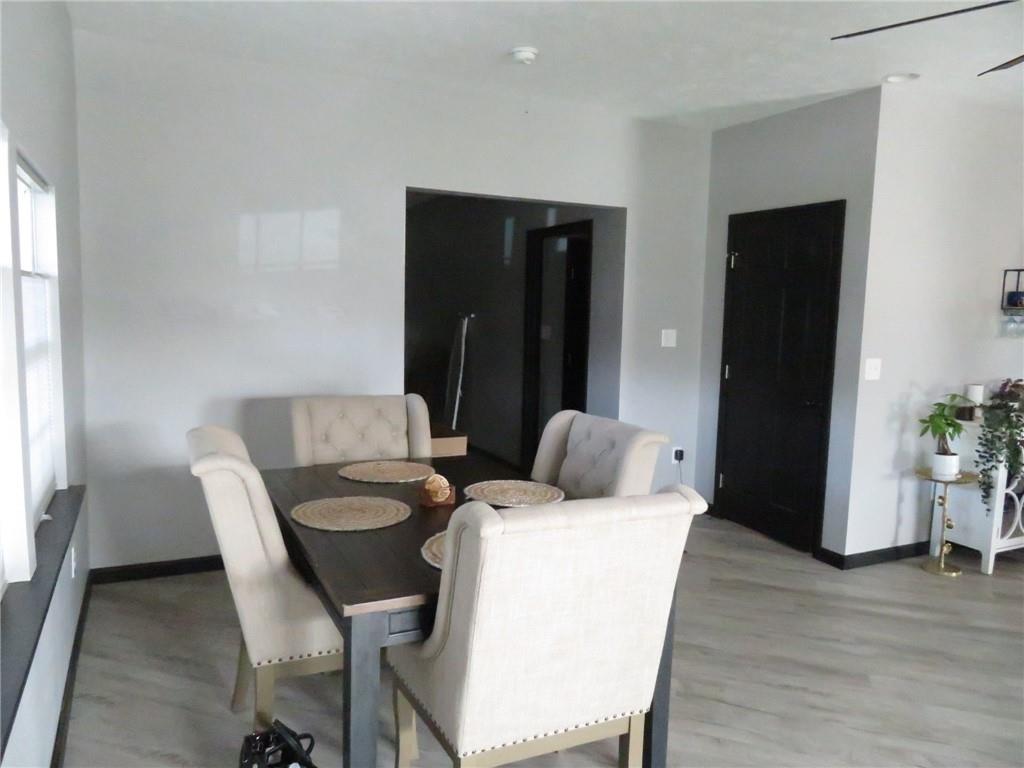 300 3rd Street Langeloth, PA 15054 - Photo 6 of 38 a dining room with furniture and wooden floor