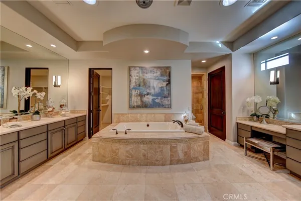 a large room with a large bed and furniture