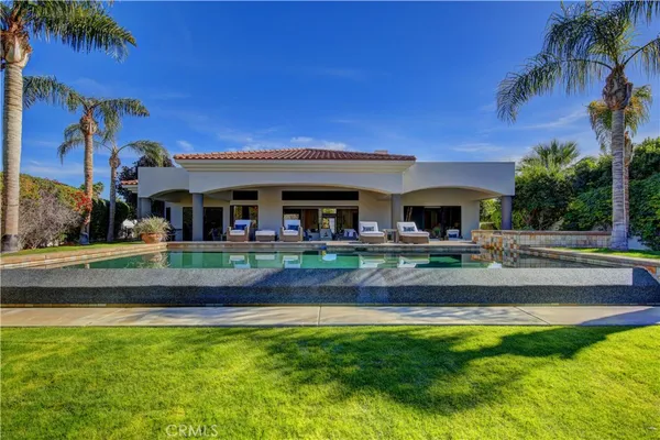 a view of a house with a swimming pool