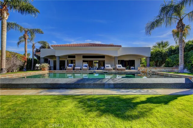 a view of a house with a swimming pool