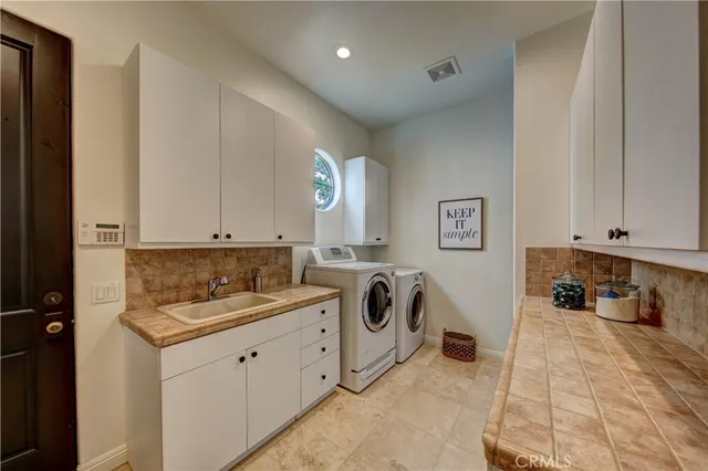 a view of a lake with sitting area