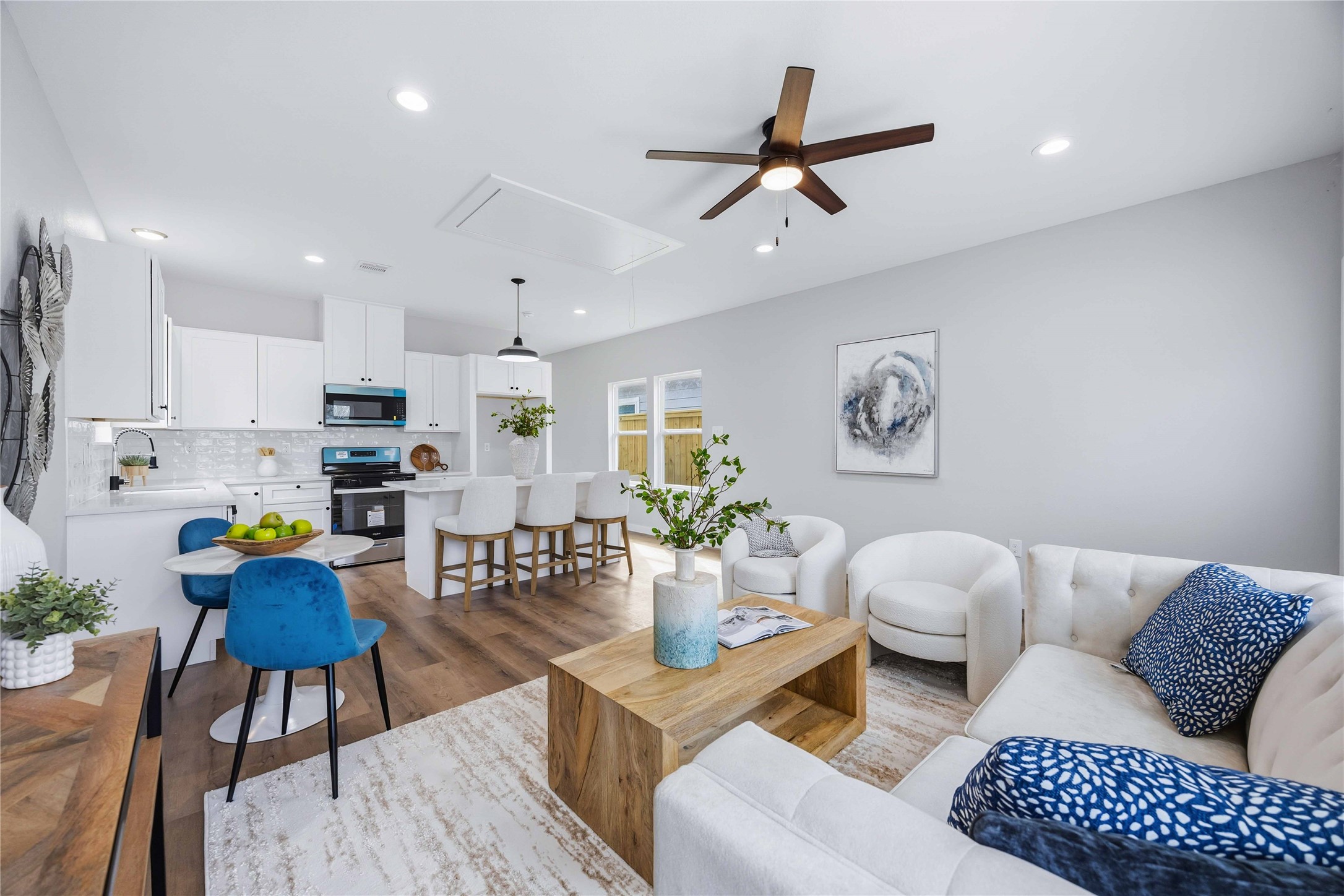 7316 Victoria Street Houston, TX 77020 - Photo 2 of 21 This view showcases open concept living area with seamless flow between the kitchen and living room.