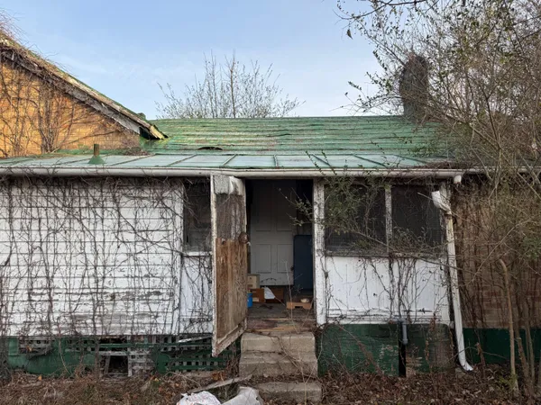 a view of a house with a porch